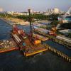 PT Brantas Abipraya (Persero) mengerjakan proyek National Capital Integrated Coastal Development (NCICD) Melalui pembangunan tanggul laut.